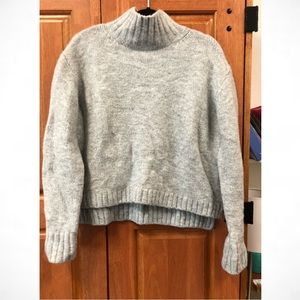 Women’s light gray turtleneck pullover sweater